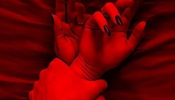 man and woman's hands together